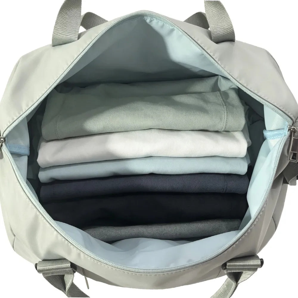 Expandable Travel Tote Bag with Luggage Sleeve — 24L to 32L Light Blue Weekender Duffel - Detail View 6 - Driulug supplier